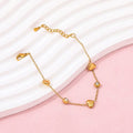 “Golden heart‑beat bracelet with sparkling gems – wear love in every link 💛✨"