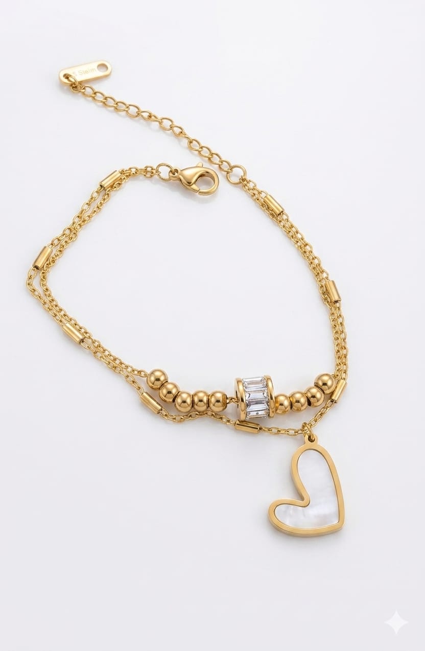 Double chain bracelets with enamel black/white heart, gold beads & crystal charm