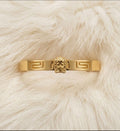 "Effortless chic with this stunning gold Greek key bangle"