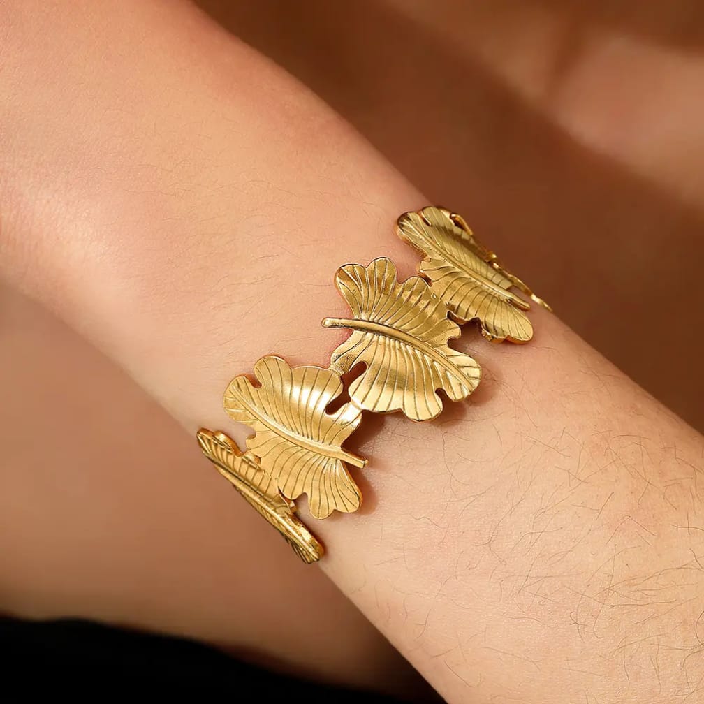 Bold gold leaf cuff that wraps your wrist in luxury💫 stainless steel cuff