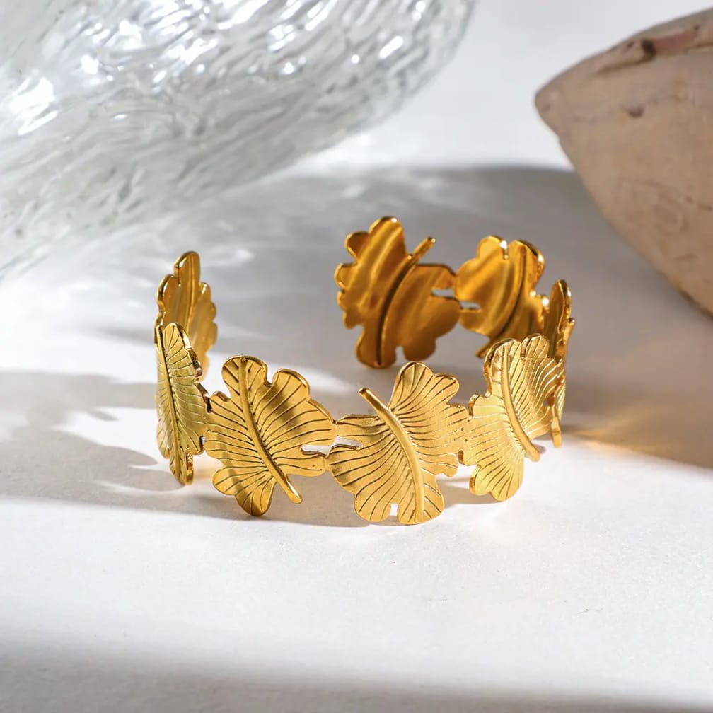 Bold gold leaf cuff that wraps your wrist in luxury💫 stainless steel cuff