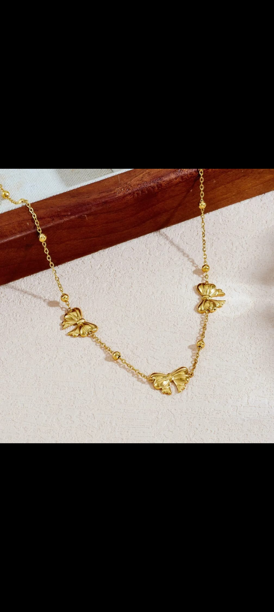 Gorgeous gold butterfly charm necklace that catches every eye!
