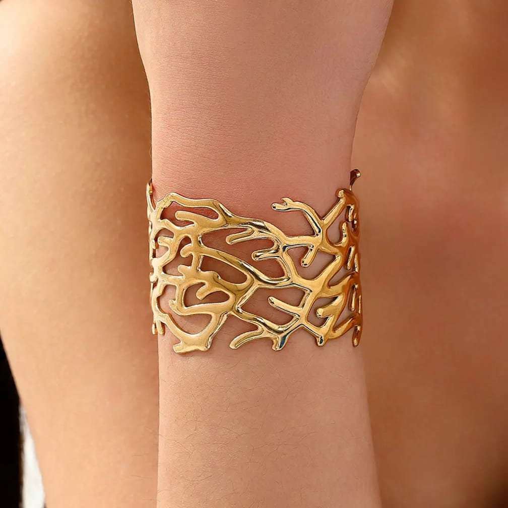 Wearable Art for Your Wrist ✨
Sculpted coral branch cuff in high polish gold