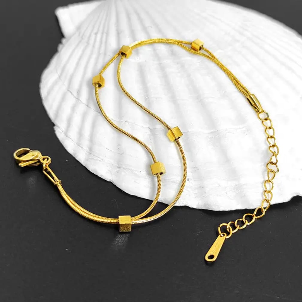 Sleek snake chain bracelet with floating gold cubes ✨️ stainless steel bracelet