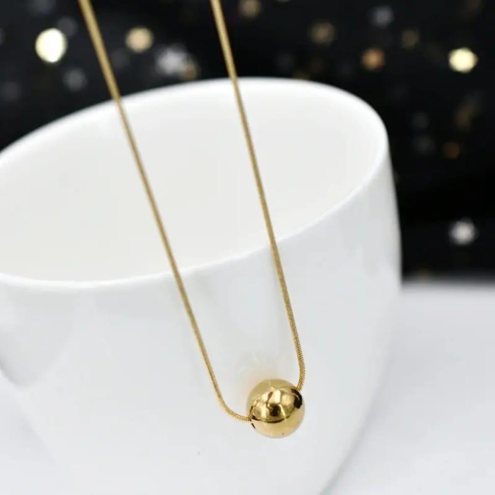 “Proof that simple is stunning ✨ One golden sphere, endless elegance"