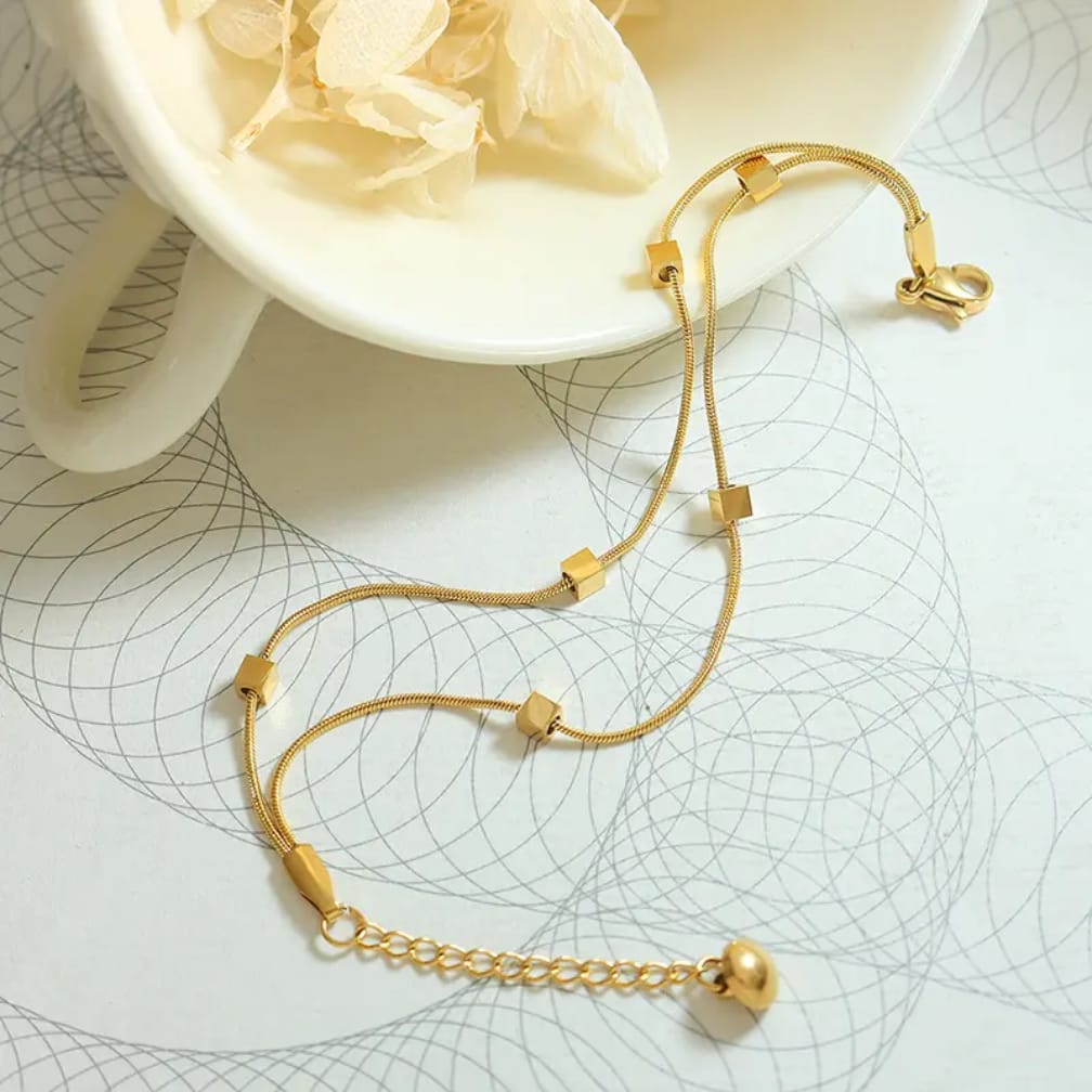 Sleek snake chain bracelet with floating gold cubes ✨️ stainless steel bracelet