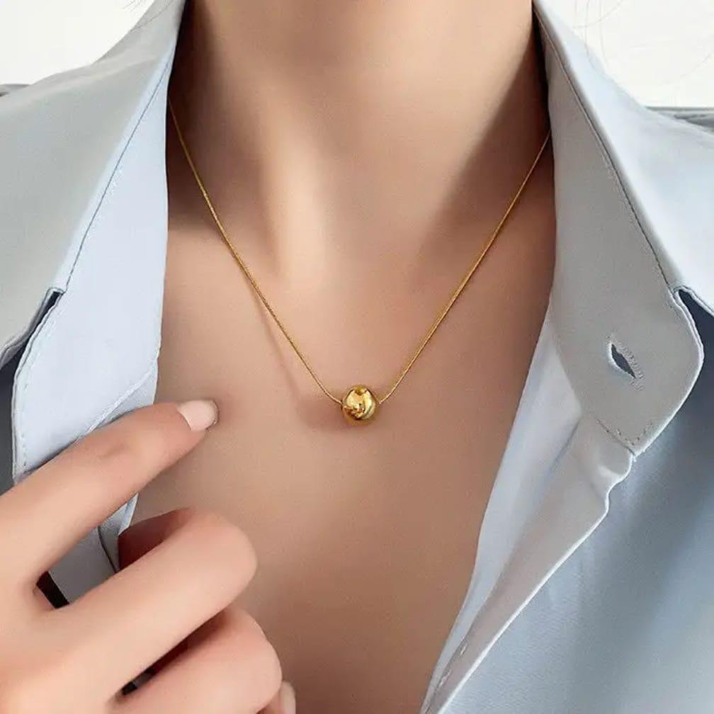 “Proof that simple is stunning ✨ One golden sphere, endless elegance"